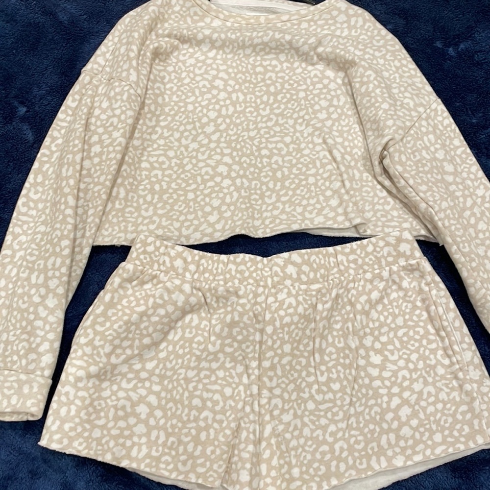 Crop top sweater with matching leopard shorts lose fit.